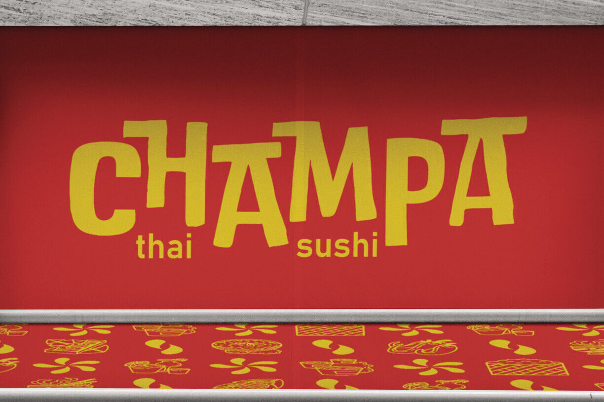 Store front with red background and yellow patterns.