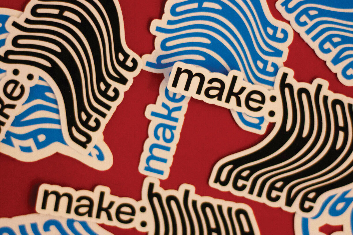 Closeup of stickers scattered on a table.